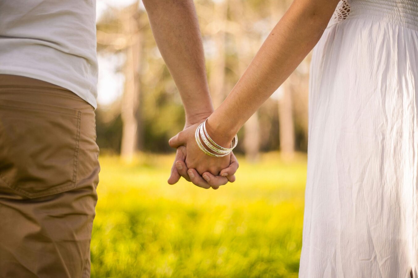 Husband and wife holding hands